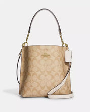 Coach Bucket Mollie 22 En Lona De Firma Fondo Rosa