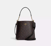 Coach Bucket Mollie Signature Marrón
