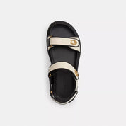 Sandalias Coach Negro y Blanco con Logo Dorado
